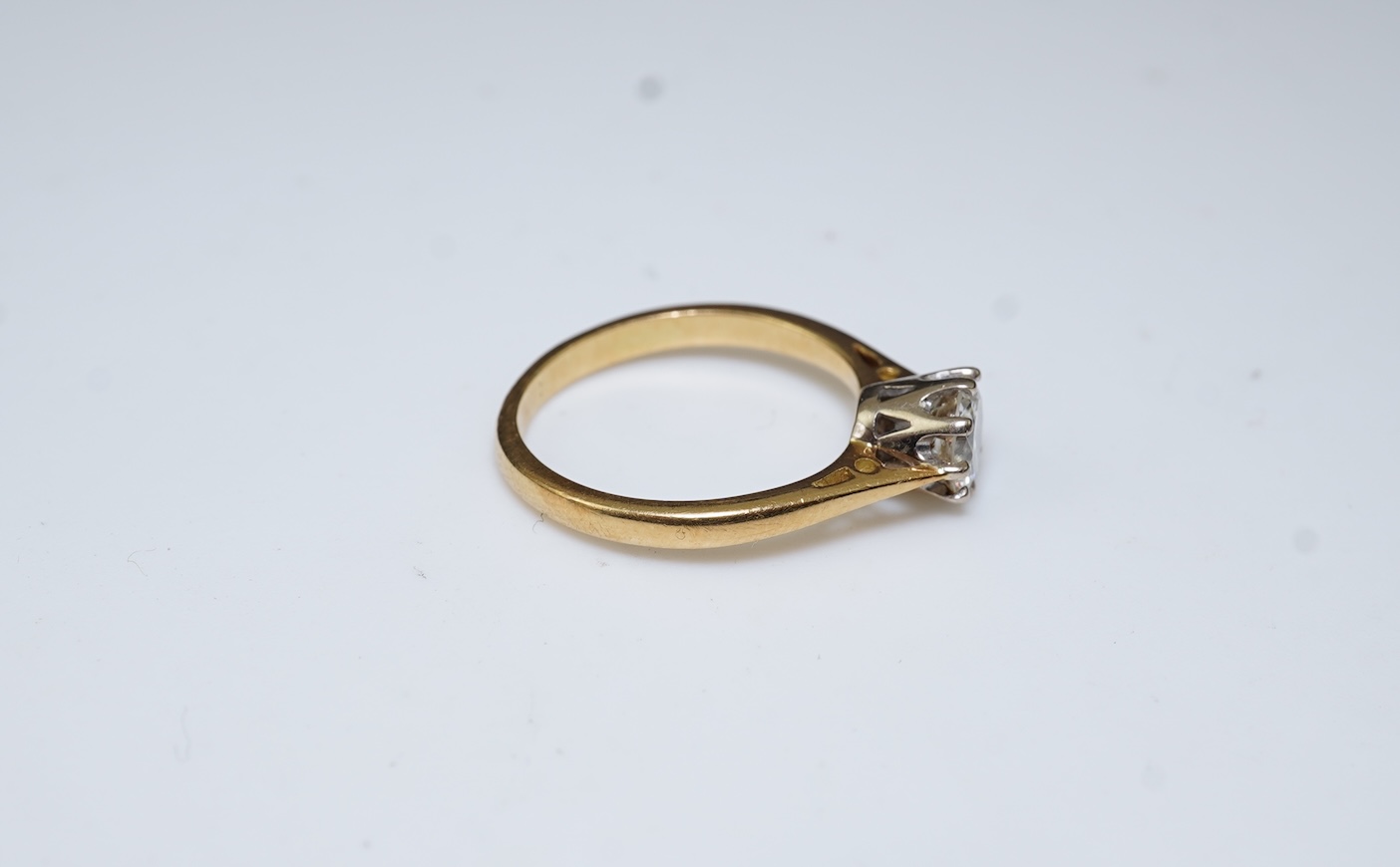A diamond solitaire ring
